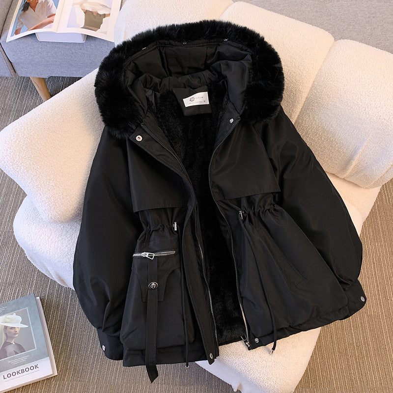 Elegant women's winter coat with faux fur collar – stylish and warm winter outfit