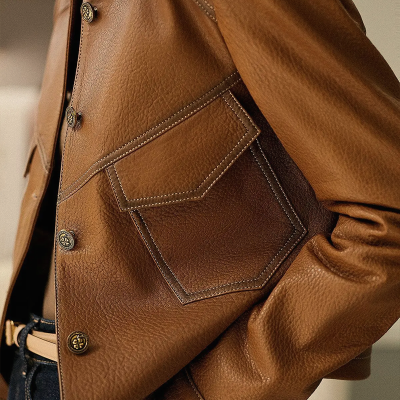 Elegant women's jacket in stylish brown tone with long sleeves