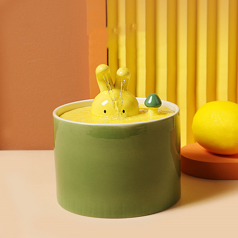 Distributore d'acqua elegante per un coniglio sano e felice